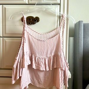 American Eagle Size Medium- cut out shoulder detail, crop top. Good used